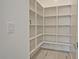 Well-organized pantry with adjustable shelving at 5509 N 193Rd Ave, Litchfield Park, AZ 85340