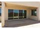 Covered patio with sliding glass doors at 5509 N 193Rd Ave, Litchfield Park, AZ 85340