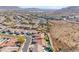 Aerial view showcasing a house with a pool and desert landscape at 6107 W Hedgehog Pl, Phoenix, AZ 85083