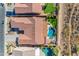 Aerial view showcasing a house with a pool and desert landscaping at 6107 W Hedgehog Pl, Phoenix, AZ 85083