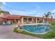 Large backyard with a kidney shaped pool and covered patio at 6107 W Hedgehog Pl, Phoenix, AZ 85083