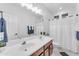 Bathroom with double sinks and shower/tub combo at 6107 W Hedgehog Pl, Phoenix, AZ 85083