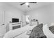 Bedroom with fireplace and view of living room at 6107 W Hedgehog Pl, Phoenix, AZ 85083