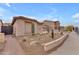 Front view of a beautiful home with a walkway at 6107 W Hedgehog Pl, Phoenix, AZ 85083