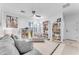 Living Room with gray sofa, comfortable armchair, and built-in shelving at 6107 W Hedgehog Pl, Phoenix, AZ 85083