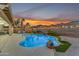 Stunning pool area at sunset, perfect for entertaining at 6107 W Hedgehog Pl, Phoenix, AZ 85083