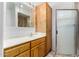 Bathroom features a large vanity and a shower stall at 6457 E Dallas St, Mesa, AZ 85205