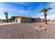 Ranch house with a two-car garage and spacious driveway at 6457 E Dallas St, Mesa, AZ 85205