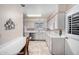 Full kitchen view, showcasing ample counter space and cabinetry at 6457 E Dallas St, Mesa, AZ 85205