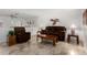 Living room featuring a brown couch and matching recliner chairs at 6457 E Dallas St, Mesa, AZ 85205