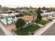 Aerial view showcases the house, pool, and surrounding landscape at 6547 E Eugie Ter, Scottsdale, AZ 85254