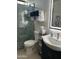 Well-lit bathroom featuring glass shower, decorative tile and modern sink at 7400 E Gainey Club Dr # 222, Scottsdale, AZ 85258