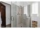 Modern bathroom featuring a glass-enclosed shower with multiple showerheads and updated fixtures at 7400 E Gainey Club Dr # 222, Scottsdale, AZ 85258