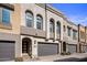 Modern 2-story townhome with attached garage and landscaped front yard at 7460 E Via De Luna Dr, Scottsdale, AZ 85255