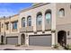 Modern 2-story townhome with attached garage and landscaped front yard at 7460 E Via De Luna Dr, Scottsdale, AZ 85255