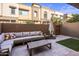 Private patio with seating area and artificial turf at 7460 E Via De Luna Dr, Scottsdale, AZ 85255