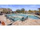 Community pool and spa with comfortable seating at 7460 E Via De Luna Dr, Scottsdale, AZ 85255