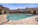 Community pool with patio and lounge chairs at 7460 E Via De Luna Dr, Scottsdale, AZ 85255