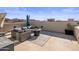 Rooftop deck with seating, fire pit, and city views at 7460 E Via De Luna Dr, Scottsdale, AZ 85255