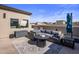 Rooftop deck with seating, fire pit, and city views at 7460 E Via De Luna Dr, Scottsdale, AZ 85255