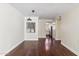 Bright dining room with hardwood floors and view into kitchen at 750 E Northern Ave # 1089, Phoenix, AZ 85020