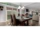 Bright dining area with table and chairs near kitchen at 8100 E Camelback Rd # 14, Scottsdale, AZ 85251