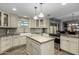 Updated kitchen featuring granite counters and island at 8100 E Camelback Rd # 14, Scottsdale, AZ 85251