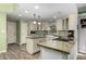 Modern kitchen with granite countertops and island at 8100 E Camelback Rd # 14, Scottsdale, AZ 85251