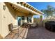 Outdoor patio features a dining table, chairs and built-in grill at 8100 E Camelback Rd # 14, Scottsdale, AZ 85251