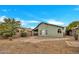 Spacious backyard with flagstone pathway and desert plants at 8533 E Monte Ave, Mesa, AZ 85209