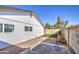 Artificial turf and gravel backyard with a block wall for privacy at 8641 E Fillmore St, Scottsdale, AZ 85257