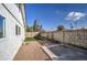 Landscaped backyard with artificial turf and a block wall at 8641 E Fillmore St, Scottsdale, AZ 85257