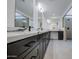 Elegant bathroom featuring double vanity and marble at 8641 E Fillmore St, Scottsdale, AZ 85257