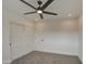 Spacious bedroom with closet and ceiling fan at 8641 E Fillmore St, Scottsdale, AZ 85257