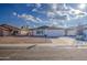 Front view of a renovated single story home with a white garage door at 8641 E Fillmore St, Scottsdale, AZ 85257