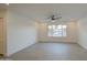 Living room featuring large windows and tile floors at 8641 E Fillmore St, Scottsdale, AZ 85257