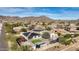 House with solar panels, pool, and a large backyard; mountain views at 8793 W Villa Lindo Dr, Peoria, AZ 85383