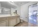 Elegant bathroom with double vanity and view of backyard at 8793 W Villa Lindo Dr, Peoria, AZ 85383