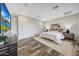 Bright bedroom with large closet and wood-look tile floor at 8793 W Villa Lindo Dr, Peoria, AZ 85383