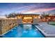 Relaxing pool area with covered patio and water feature at 8793 W Villa Lindo Dr, Peoria, AZ 85383