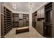 Large walk-in closet with ample shelving and drawers at 8793 W Villa Lindo Dr, Peoria, AZ 85383