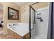 Relaxing bathroom with garden tub and walk-in shower at 9030 S Maple Ave, Tempe, AZ 85284