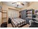 Cozy bedroom with a built-in bookcase and desk at 9030 S Maple Ave, Tempe, AZ 85284