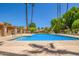 Relaxing community pool with plenty of lounge chairs and shade structures at 9030 S Maple Ave, Tempe, AZ 85284