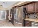 Kitchen features stainless steel refrigerator and ample cabinetry at 9030 S Maple Ave, Tempe, AZ 85284