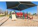 Playground with shade structure and play equipment at 9030 S Maple Ave, Tempe, AZ 85284