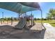 Shaded playground with slides, climbing structures, and swings at 9030 S Maple Ave, Tempe, AZ 85284