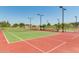 Well-maintained tennis courts with ample space and surrounding landscape at 9030 S Maple Ave, Tempe, AZ 85284