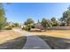 Curving walkway near homes and grassy areas at 9030 S Maple Ave, Tempe, AZ 85284