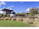 Modern community entrance with stylish architecture and landscaping at 9364 W Cashman Dr, Peoria, AZ 85383